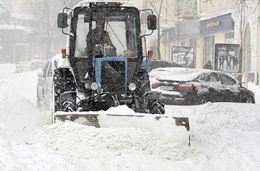 Заснеженный Киев бьет рекорды по пробкам и авариям